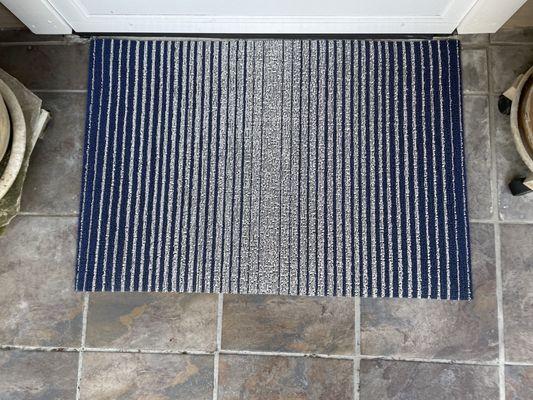 The front door rug, a few to choose from