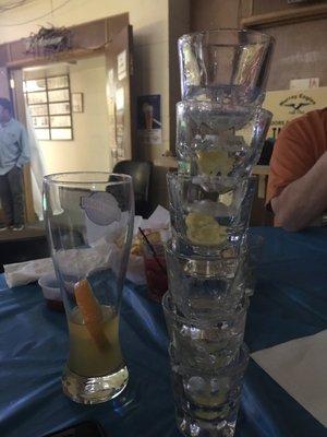 Leaning tower of shot glasses