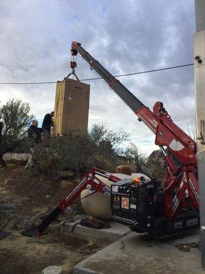 Mountaintop install with a spyder crane.