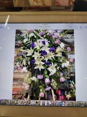 The floral arrangement will be similar to this photo.