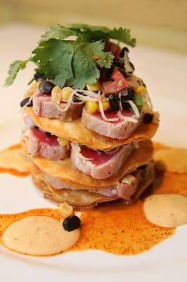 Ahi tuna tostada- Tortillas, black bean jicama relish, chipotle creme & chile lime vinaigrette...