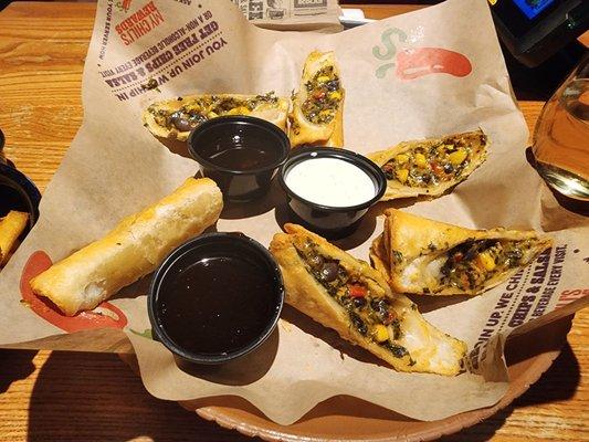 Southwestern Eggrolls with the avocado ranch dressing. The other 2 cups contain the honey chipotle sauce to dip my fries in.