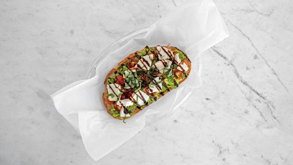 Scottsdale Toast 
toasted sourdough and buttery avocado topped with creamy mozzarella, vine ripe tomatoes, fresh basil with balsamic glaze