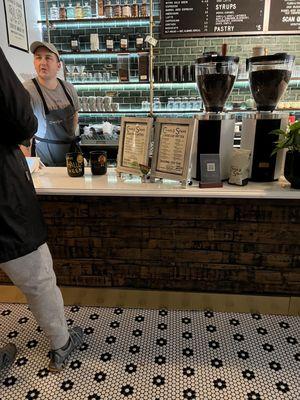 Inside at the Barista counter where you order.