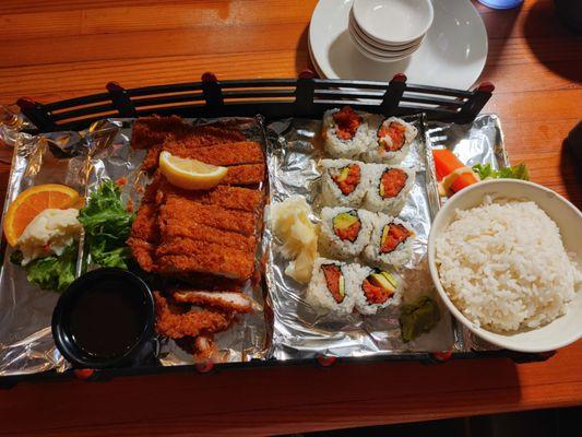 Tonkatsu (pork cutlet) and Spicy Tuna Roll dinner. Highly recommend!