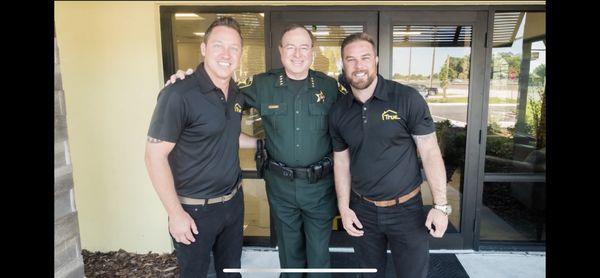 Owners with sheriff Grady Judd