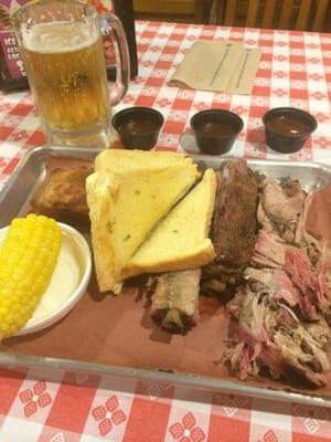 Combo plate with ribs and pulled pork.