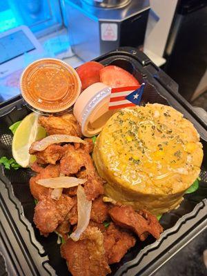 Mofongo qith fried chicken..boneless thighs deep fried with mofongo and garlic oil..