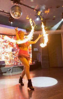 Fire fan dancer.