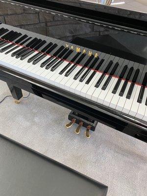 Gorgeous piano in the foyer!