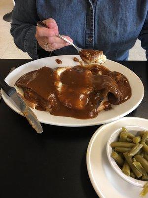 Open faced beef sandwich with mashed potatoes and green beans. $6.75