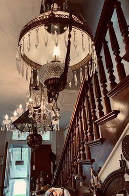 Chandeliers near the entry staircase