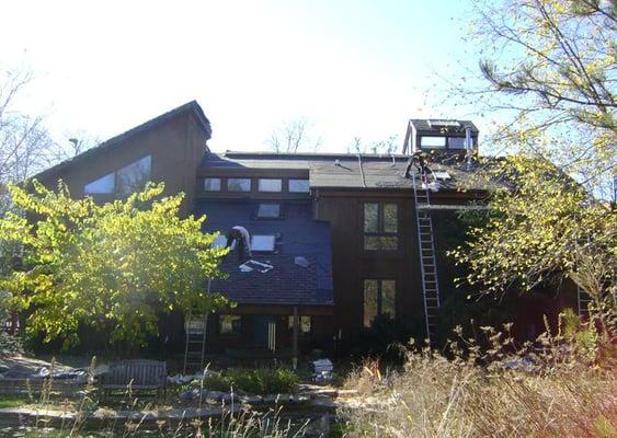 The crew hard at work, installing a new roof!