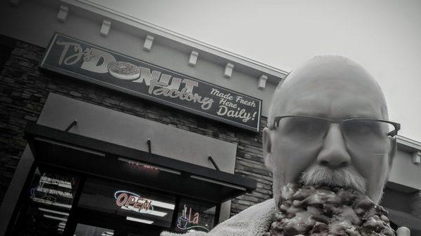 Lonny (a.k.a. " Donut Duster") with Donut Explorers devouring an awesome apple fritter at TJ's Donut Factory!