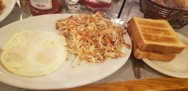 3 eggs, overeasy, hashbrowns and Texas toast.