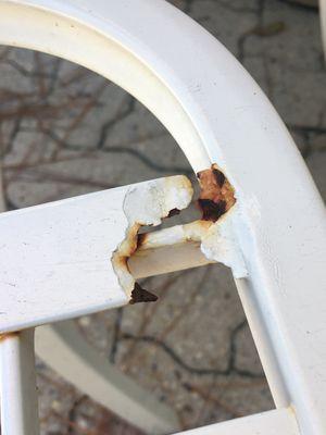 Rusted out patio furniture, this is one of the chairs.