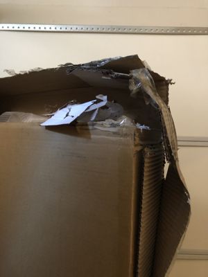 Box torn apart during shipping.