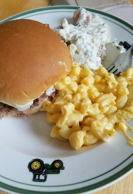 Pulled pork sandwich with sides (Mac & Cheese and Red Potato Salad). Both solid choices.