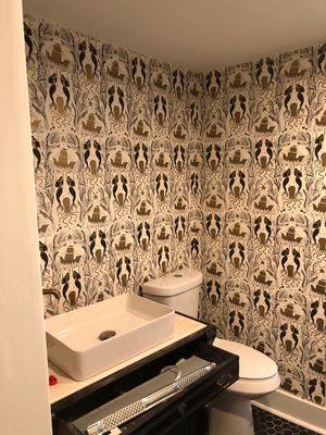 Remodeled half bathroom wall paper walls custom vanity sink made from dresser new toilet