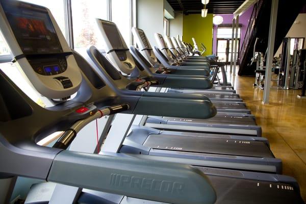 Precor Cardio equipment with touchscreen Preva consoles.