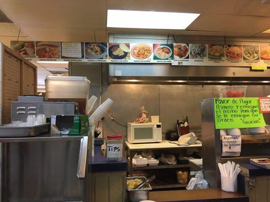 A small taqueria inside a grocery store