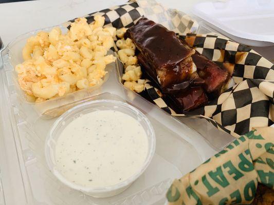 Tried the ribs and mac and cheese to go today!