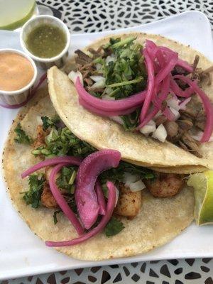 Shrimp taco and carnitas taco