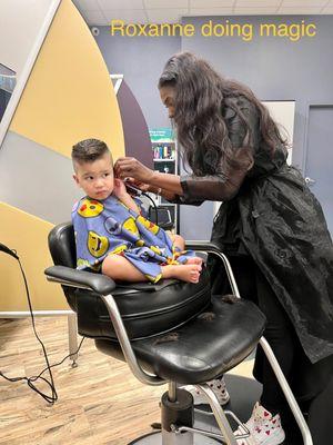 Kid sat still for haircut. Baby whisperer. Helps that she's pretty, I'm sure.