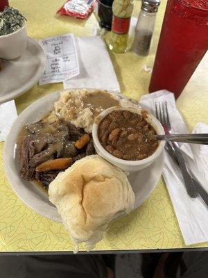 Roast Beef, mashed potatoes and gravy and pinto beans