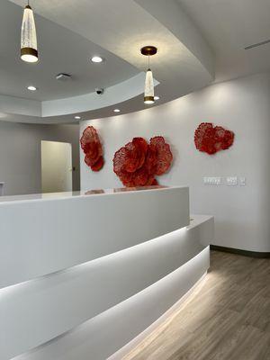 Coliseum Dental WC new front desk with wall display