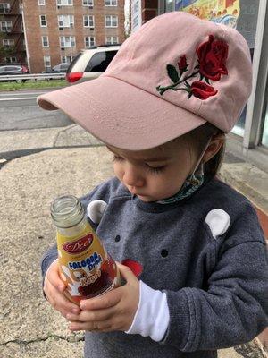 A curious customer enjoying a Thai soft drink from Brothers!