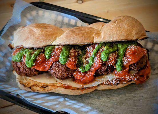 The Banzo - Garbanzo "meatballs", marinara, pesto, provolone or vegan cheese, braided roll.