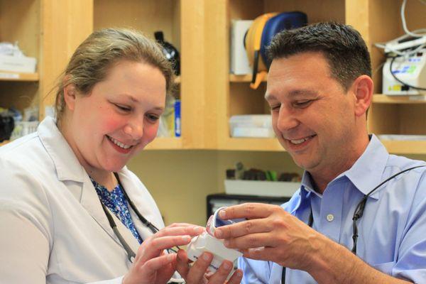 Dr. Richardson and Dr. Iuculano in our office lab.