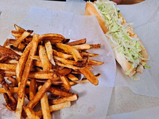 Buffalo Chicken Cheesesteak . Hot Sauce already added. Those fries are the best! .