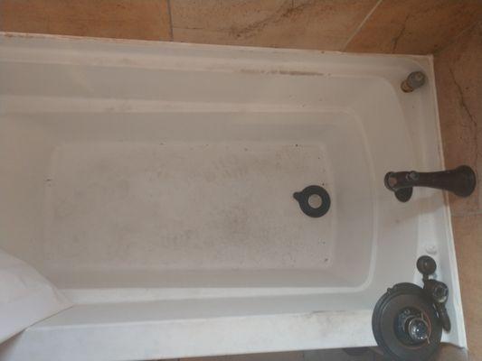 Here are all the parts to our shower that are scattered around due to the 1st plumber breaking it.