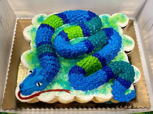 Three dozen cupcakes formed into a snake to make a boy's birthday dreams come true!