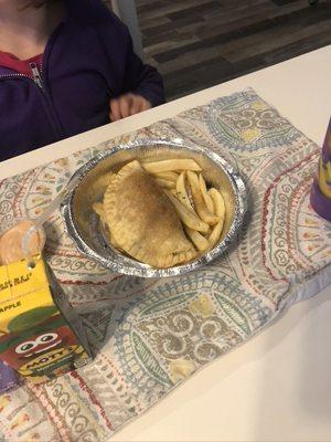 Pizza empanadilla kids meal with fries and an apple juice