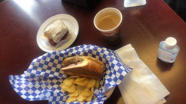 Cubanos sandwich, coffee with milk, no sugar and one sweet cake.. yum