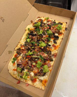 Flatbread with mushroom, bacon, avocado, and pico