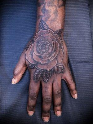 Hand Rose Tattoo