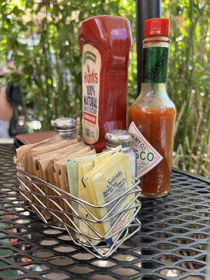 Outside seating...and condiments..