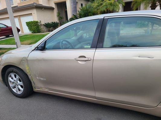 Notice the yellow paint? Apparently, someone in a yellow car hit my mom's car while she was at Walmart. Hmmm