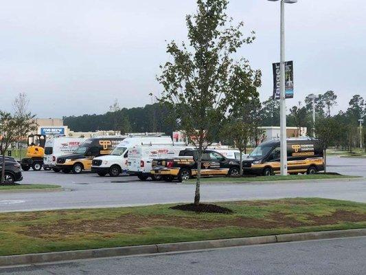 Our fleet of Thompson & Thompson Service Group Heating and Air and RooterMan Plumbers trucks.