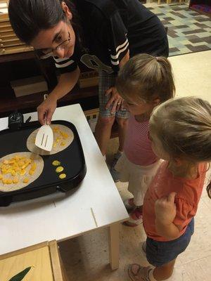 Cooking healthy food together as we learn about the different food groups.