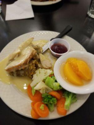 Lighter fare menu Turkey dinner w/sides of vegetable medley and fruit of the day.