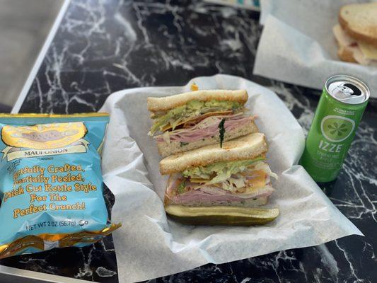 Sandwich, chips, and drink = perfect meal combo