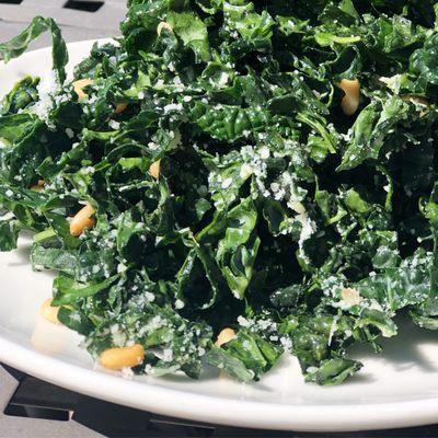 Lacinto kale salad with pine nuts and golden raisins