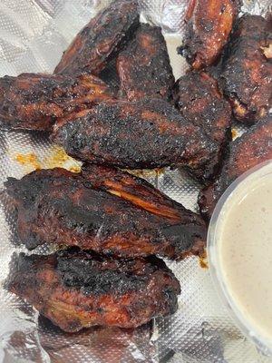 Burnt wings and no flavor.