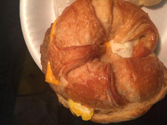 Sausage,  egg, and cheese croissant look at the size of this croissant!!