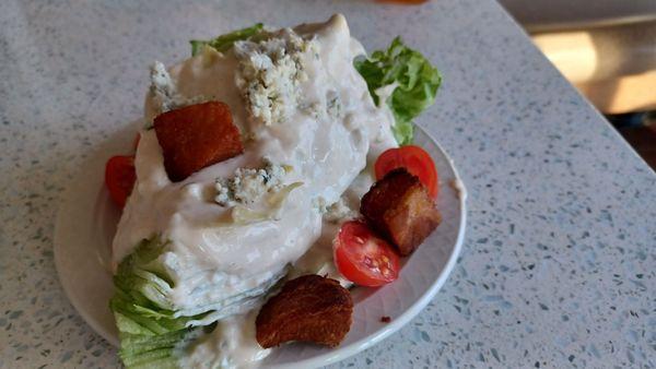 Wedge salad with tons of blue cheese dressing and deep fried pork belly